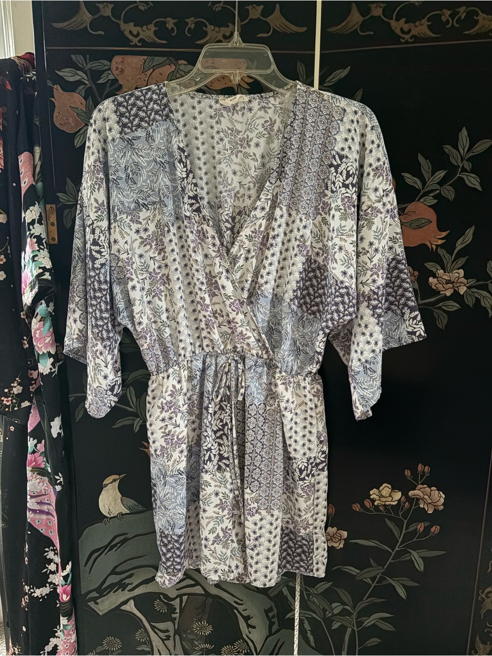 1.4.3. Story by Line Up Lavender and White Mixed Floral Romper
